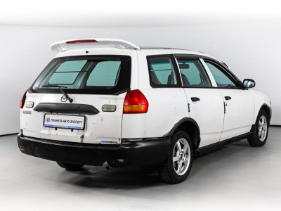Mazda Familia 1.5 AT (110 л.с.)